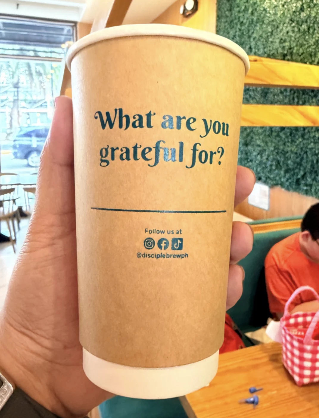 A Disciple Brew cup asking, ‘What are you grateful for?’