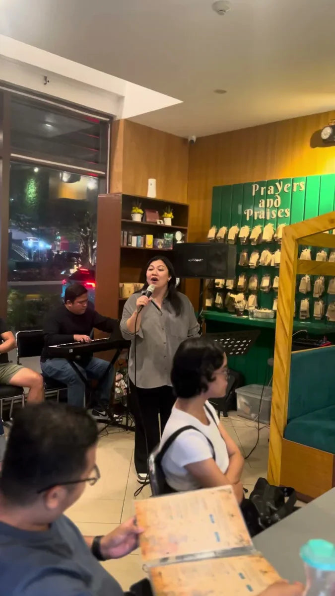 A moment of heartfelt singing and thanksgiving at the café